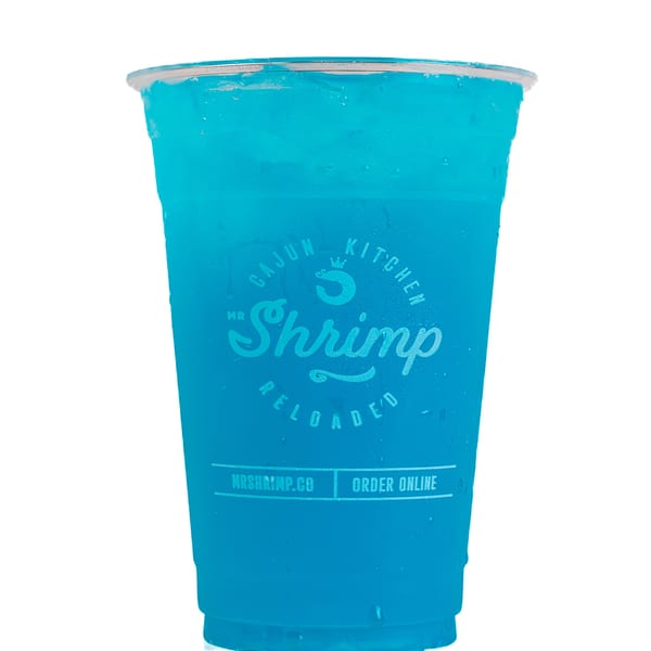 Blue iced beverage in a lidded Mr. Cajun Shrimp cup against a white background.