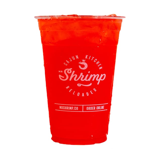 Bright red plastic cup filled with ice and a drink, branded Mr. Shrimp Cajun Kitchen and Seafood.